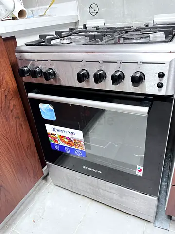 Stainless steel gas range with built-in oven