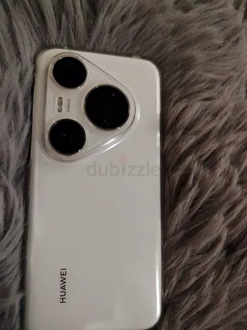 White Huawei phone with triple rear cameras - used, working