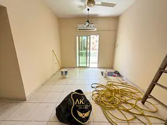 HOT Offer Spacious 2BHK with balcony Rent only 36000AED Yearly