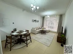 Luxury one-bedroom apartment with a balcony and open views. Ajman, Al Yasmin Towers. Fully furnished