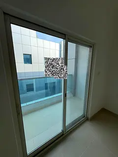 Apartments for sale in Ajman, City Towers, with parking, one bedroom and living room.
