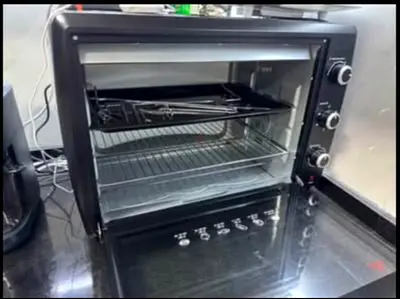 Electric oven 2200w black and decker brand new 70L