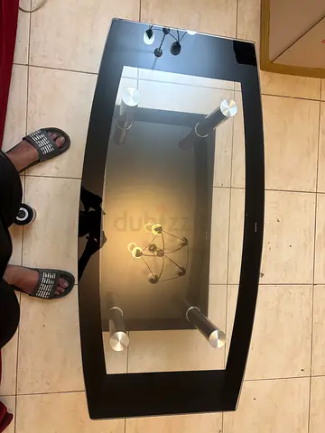 My black glass coffee table with chrome legs - used urgent sale