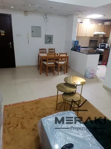 Two bedrooms and a living room for rent in City Towers, Ajman, with an open view of the bridge great price