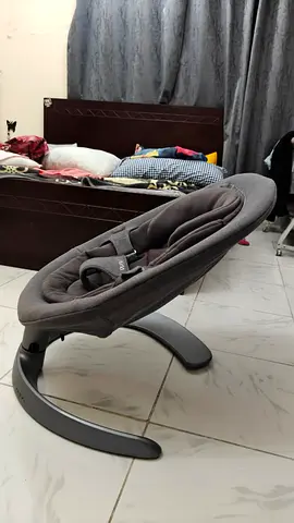 Gently used grey baby bouncer/rocker seat