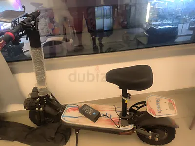 Used electric scooter with seat and charger
