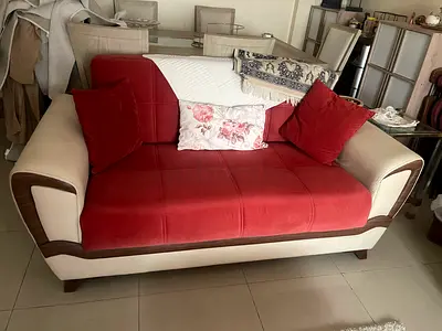 My red and cream 2-seater sofa and 2 sofa , 3 seater and one chair in good condition