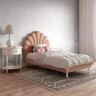 My pink velvet single bed with shell headboard