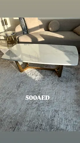 My marble-top coffee table with gold metal base - 500 AED