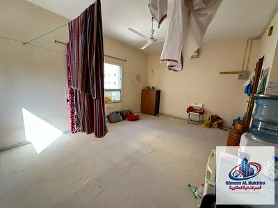 A luxurious two-bedroom apartment with a living room, very excellent spacious area, central air conditioning, central gas, and built-in wardrobes.