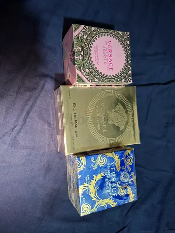 Three boxed Versace perfumes (Bright Crystal Absolu, Pour Femme, Yellow Diamond Intense)