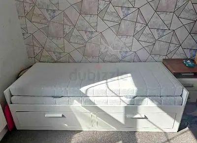 IKEA brimness daybed with 2 big storage drawers and 2 IKEA mattresses.