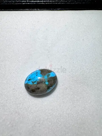 My polished blue-grey turquoise cabochon (single specimen)