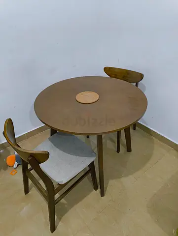 Compact round wooden dining set — table + 2 chairs