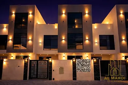 A villa for sale in Al Yasmeen, Ajman, with all registration and ownership fees included. Located on the main street, this villa is ready