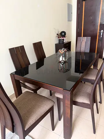 My wooden dining table set with glass top and 6 chairs