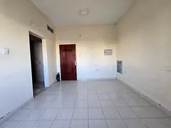 Studio for annual rent in Al Nuaimiya 2, Ajman, separate kitchen, spacious and excellent layout, cen