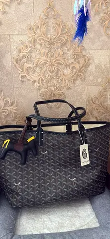 Selling Goyard-style brown tote bag with leather handles — NEW