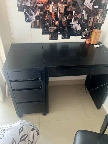 An IKEA black study table