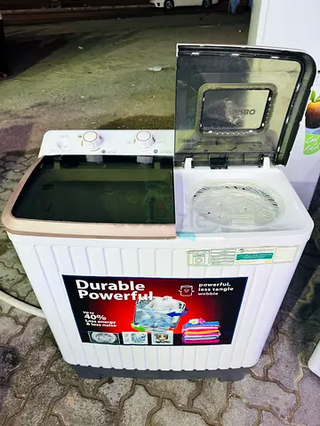 My semi-automatic twin-tub washing machine (used, working)