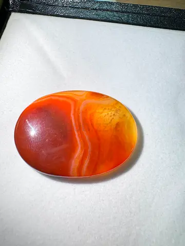 Polished Orange Banded Botswana Agate Cabochon (Oval)