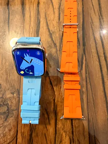 My smartwatch with two silicone sport bands — blue  orange hermes Apple Watch special edition H
