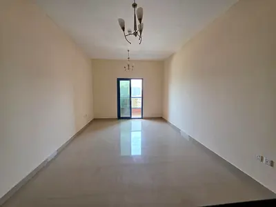 Studio apartment with parking and balcony in Al Nuaimiya Tower C – Annual price: AED 25,000 – Prime location with easy access to Dubai and Sharjah