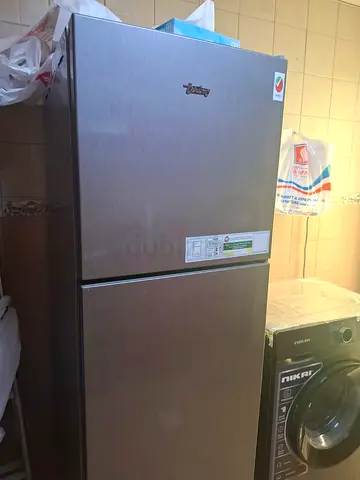 My stainless steel two-door refrigerator (top freezer) - working. Compressor warranty for 8 years.
