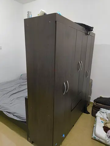 Dark brown 4-door wardrobe (armoire) — good condition