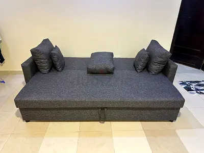 Stylish 3-Seater Sofa Bed – Storage Included  Modern and elegant design with practical features. C
