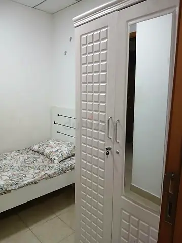 fully furnished maids room with attached washroom in Dubai Marina right next to DMCC metro station.