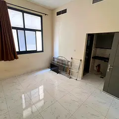 Studio apartment for annual rent in Al Jurf 3, Ajman. Second occupancy. Semi-separate kitchen. Good