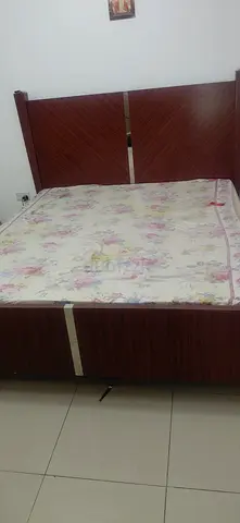 Wooden double bed frame with mattress - good condition