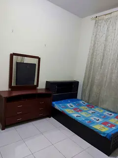 Room with separate bath available in Shabiya-11 for Indian couples /Family in new C/AC Bldg.