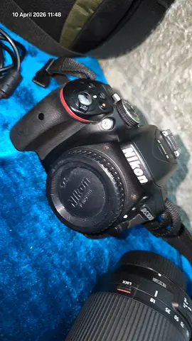 Selling my Nikon DSLR body with an 18-200mm lens—used, working perfectly, and suitable for a beginne