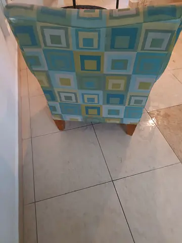 Upholstered armchair with geometric square pattern - good condition