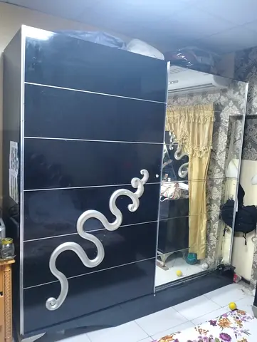 Black colour bedroom set , clean . WhatsApp please . Sharjah