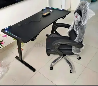 Gaming desk and ergonomic chair set with RGB lights - barely used