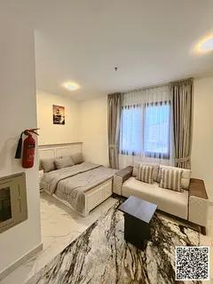 Furnished studio apartment with hotel-style furnishings for monthly rent in Ajman - Ajman Corniche -