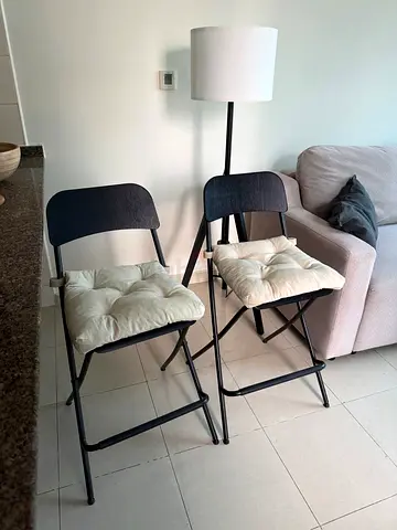 Pair of folding bar stools with cushions