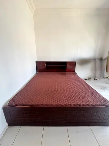King size dark wood bed with built-in headboard shelves with Mattress