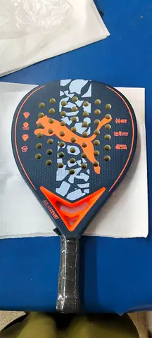 Puma padel racket - lightly used, good condition