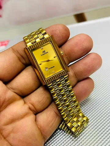 Gold-tone Laurine rectangular womens wristwatch - good condition