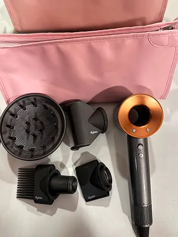 Dyson Supersonic hair dryer with attachments price negotiable