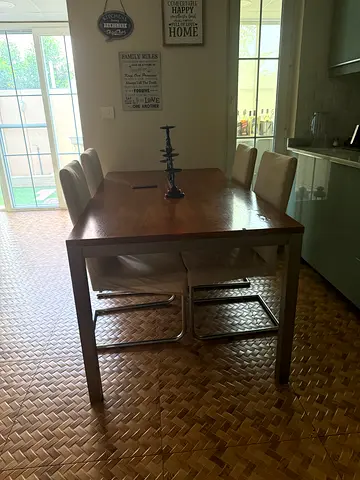 Solid wood dining table with 6 chairs — good condition