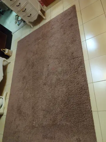 Large  dark pink rug , little used,in very good condition