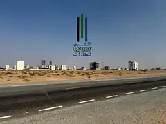 Prestigious Freehold Commercial Plot on Main Road | Dual Road Access | Open to All Nationalities | A