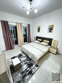 Luxury VIP apartment with one bedroom, living room, and balcony with an open view. Ajman, Mushrif. F