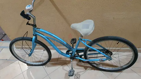 Brand Nirve MATILDA model blue step-through cruiser bike — single-speed, used