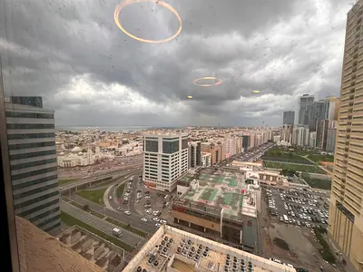 Free parking, 1BR hall in Al Khan, modern finishing, spacious, balcony view, payment plan, prime location, near Dubai exit